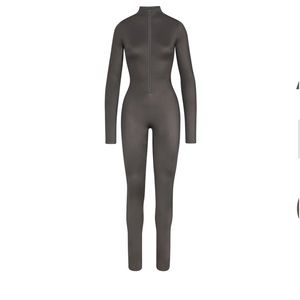 SKIMS BRAND NEW ALL IN ONE MOCK NECK ONESIE SIZE LARGE. Color: GUNMETAL NWT